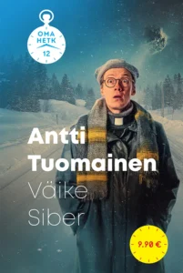 Pastor talvisel maastikul, müts peas, prillid ees ja suu ammuli.